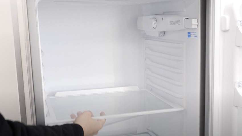 Remove shelves from fridge freezer